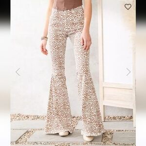 #1022 Saints & hearts animal print bell bottoms raw hem  sz S